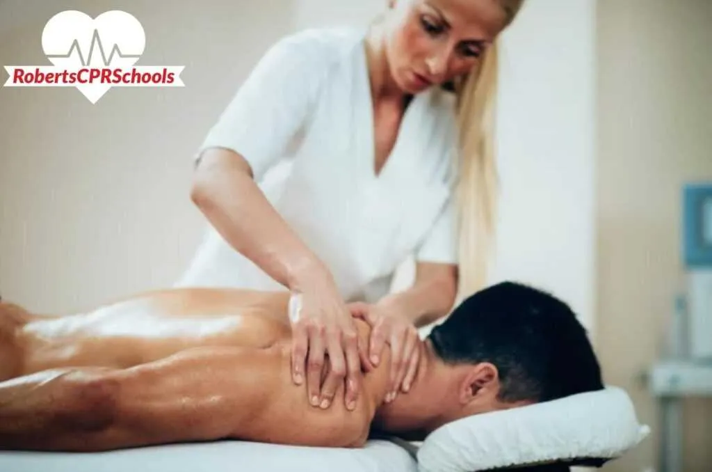 Participants engaged in a CPR training session at Roberts CPR Schools, Clifton, NJ, practicing life-saving techniques.